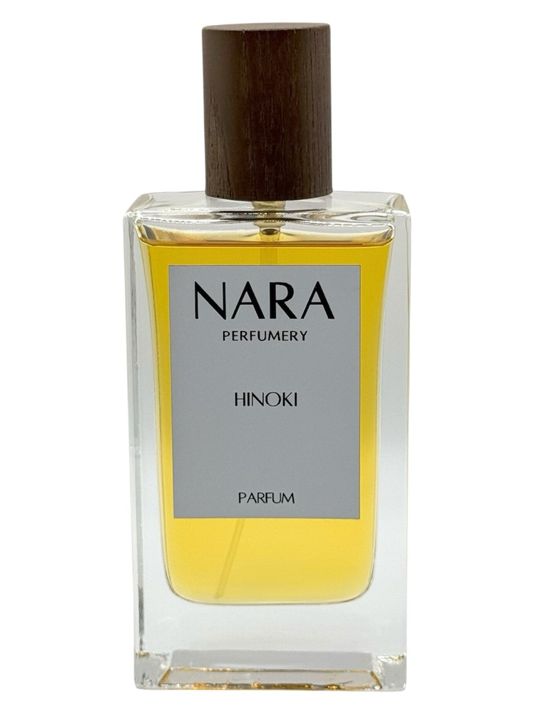 Nara Perfumery Hinoki parfum bottle with wooden cap on a white background