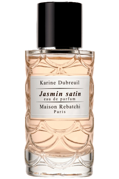 Perfume bottle labeled 'Jasmin satin' by Karine Dubreuil with a black cap on a white background
