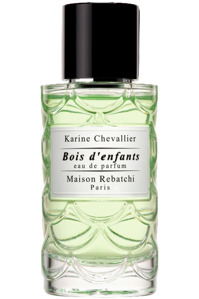 Perfume bottle labeled 'Bois d'enfants' by Karine Chevallier on a white background